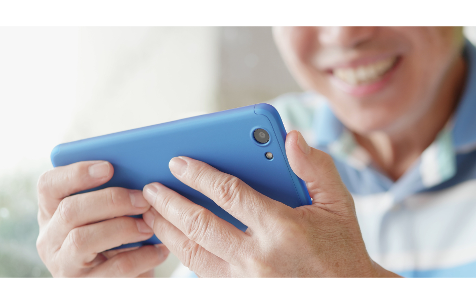 Someone watching a video on their smartphone that has been created by business